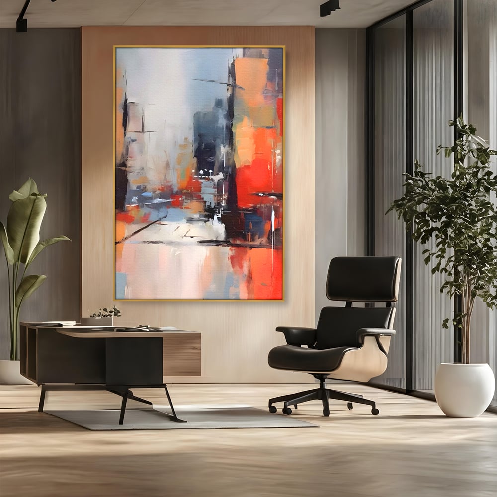 Tablou canvas cu pictura abstracta cu oras si cladiri, in rama de aluminiu auriu, pe perete intr-un birou